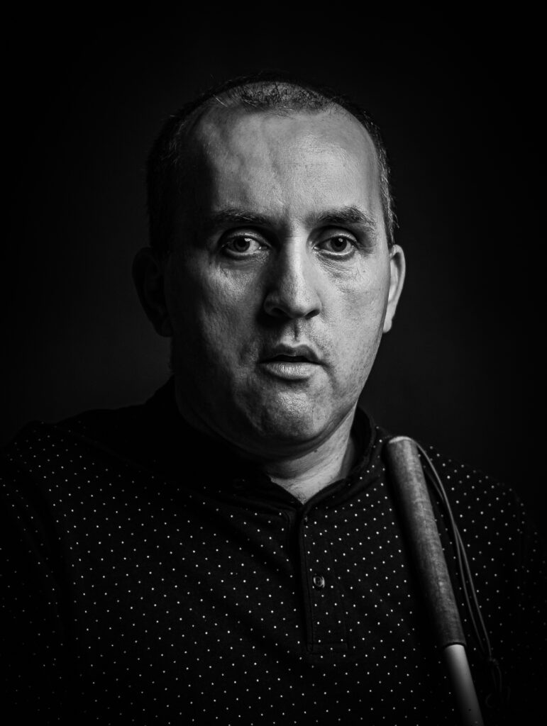 Crno-bijela portretna fotografija Vehida Hajdukovića, nagrađena u kategoriji Fotografija, autor Agdal Nuhanović